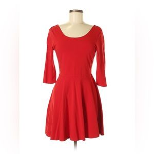 Express A-line dress in vibrant red 3/4 inch sleeves rounded back.